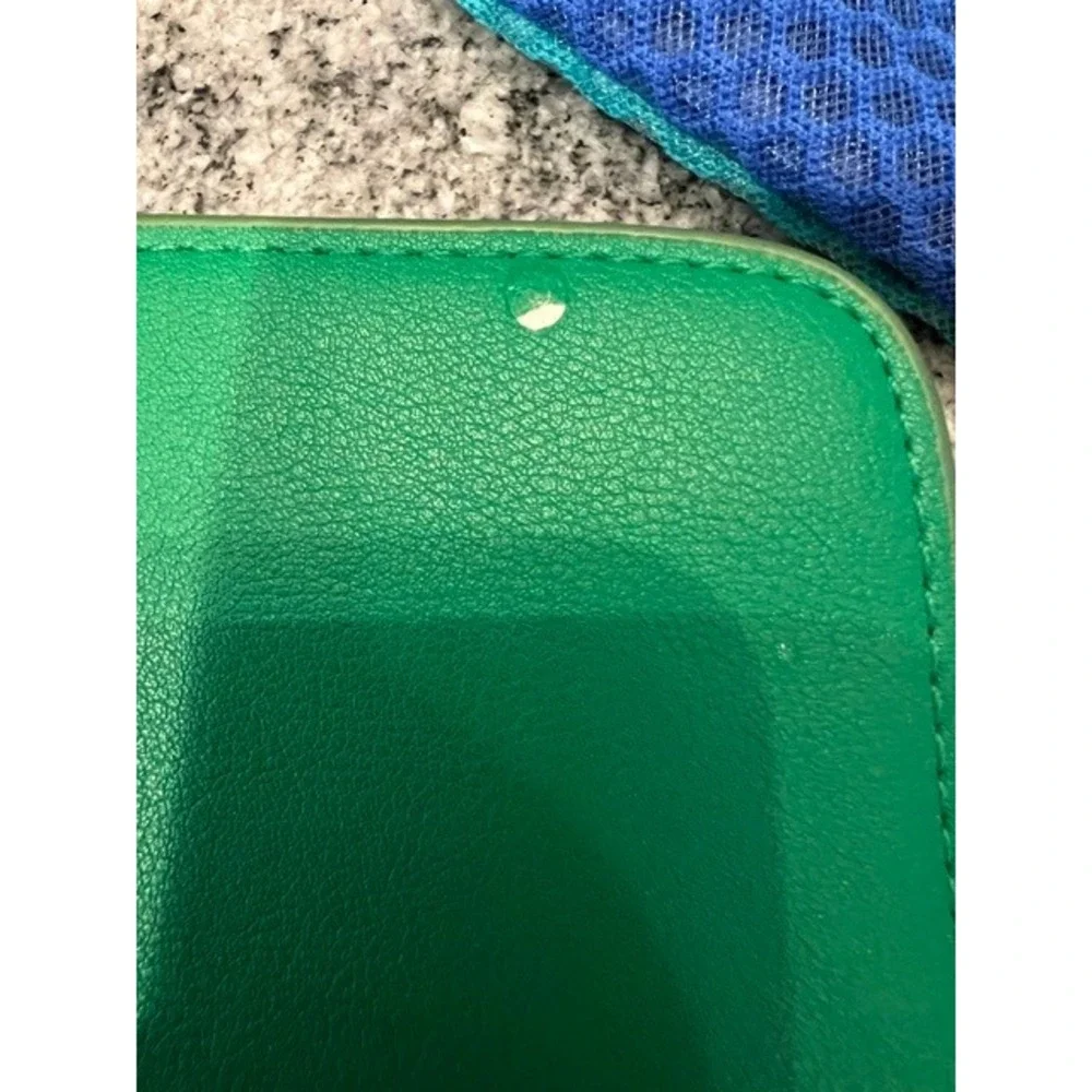 A New Day Green Zip Around Continental Wallet Wristlet‎ and a blue/teal pouch